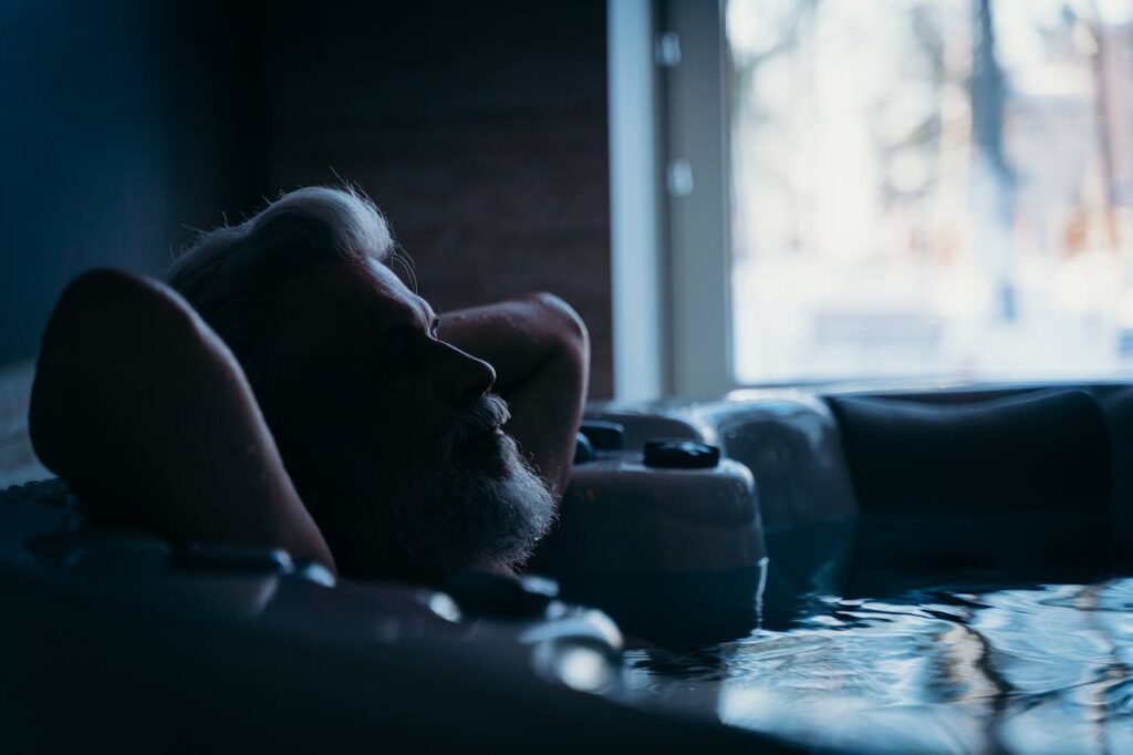 A Man Lying in a Bathtub